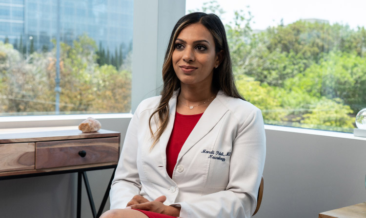 Dr. Patel sitting in her office