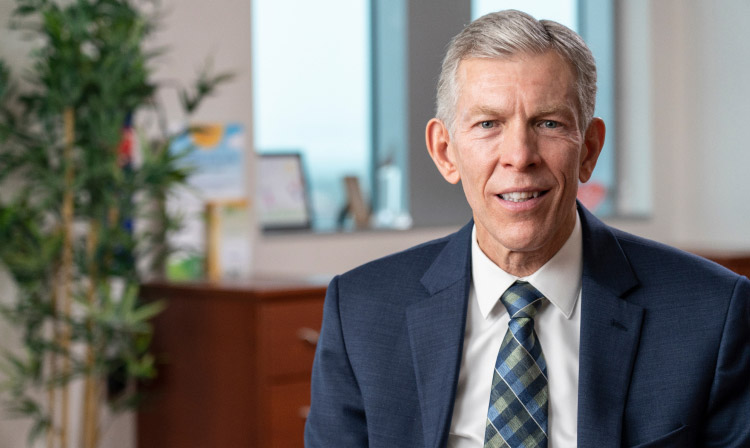 Dr. Wheless sitting in his office